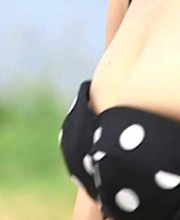 Yui Yokoyama in a provocative pose from a 2024 photoshoot, showcasing her alluring charm